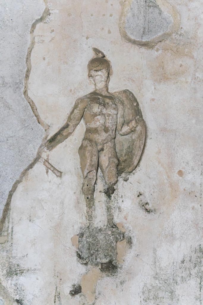 Herculaneum Suburban Baths. October 2023. 
Tepidarium, detail of stucco warrior from west side of north wall. Photo courtesy of Johannes Eber.